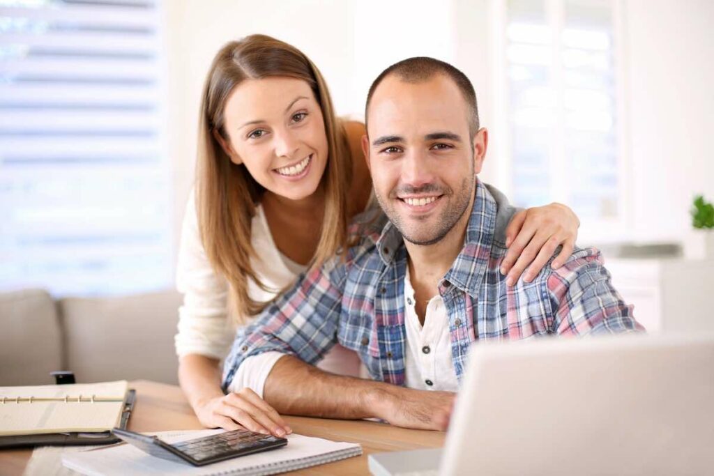 young couple reviewing finances